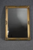 Wall mirror, gilt gesso framed. H.104 W.74cm.