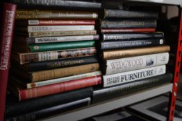 A collection of antique and pottery reference books including 'Pottery and Porcelain' by Cox and The