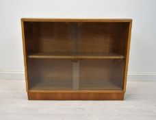 Dwarf bookcase, mid century teak. H.77 W.96 D.28 cm.