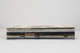 a collection of 80s 12's LPs including Simple Minds, Eurythmics and others.