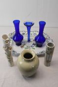 A selection of ceramics including a charger and six vases. Made by Corona Wear, Denby and, Honk Kong
