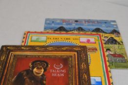 A collection of three Talking Heads 12' LPs.