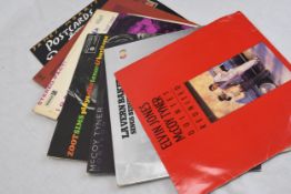 Seven assorted 12' LPs including Assorted records McCoy Tyner and Zoot Sims.