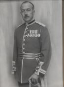 A well decorated soldier in a silver hallmarked frame. H.27 x W.22 cm.