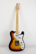 SX Guitar in a tobacco burst finish. Semi-hollow body. Made in China.