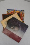 Bob Dylan four 12' LPs including 'Blood on the Tracks'.