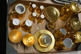 A mix of gold coloured tea set made by Wade, Royal Worcester and Royal Weston.