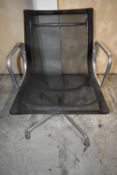 An Eames EA 107 style office desk chair. H.83 cm.