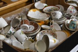 A mixed collection of various tea sets. In varied styles and patterns.