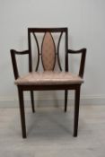 A mid century teak G-Plan armchair.