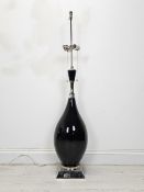 A large contemporary lamp, extending of Eastern baluster shape. H.127cm. (unextended)