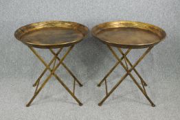A pair of gilt metal serving tables. H.65 Dia.66cm. (each)
