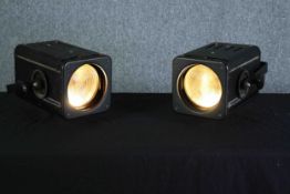 A pair of Strand spotlights. Type 833. Running soft low volt bulbs. H.20 W.30 D.30 cm.