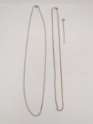 A 9ct yellow gold fine trace chain along with a yellow metal trace chain and 9ct yellow gold