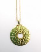 A boxed 18 carat yellow gold pendant by Zolotas and 14ct chain. The pendant in the form of a