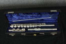 A 1960's cased bespoke made sterling silver flute by the Flute Makers Guild London, numbered 236