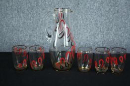 A vintage hand painted and gilded glass water jug and five matching glasses. H.29 cm. (largest)