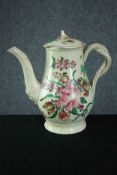 An 18th Century Creamware coffee pot and cover, circa 1780, with floral painted decoration and twist