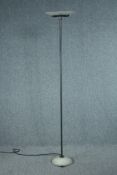 A modern floor standing uplighter lamp. H.196 cm.