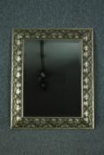 Wall mirror, silvered frame with bevelled plate. H.79 W.63cm.