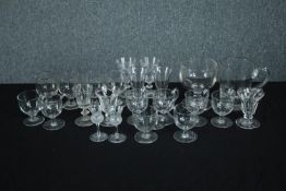 A collection of 19th and early 20th century glasses, including a set of six handled posset glasses