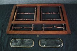 An Edwardian hat rack and two door plates. Twentieth century. H.34 W.51 cm. (largest)