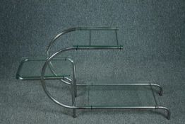 After Emile Guillot, a 1930's plate glass and chrome etagere in the Bauhaus style. H.56 W.105 D.