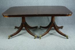 Dining table, Georgian style mahogany, twin pedestal with extra leaf. H.76 W.245cm. D.114cm.