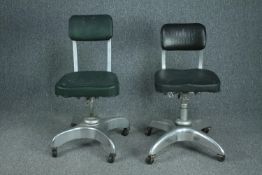 Two mid century aluminium framed revolving office desk chairs.