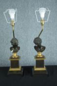 A pair of early 20th century neoclassical bronze busts on gilded plinths mounted desk lamps. H.60cm.