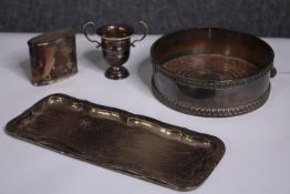 A collection of mixed English and Scottish hallmarked silver to include a Victorian wine coaster