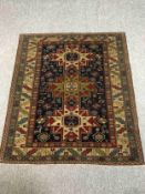 A Shirvan rug with triple medallions on a midnight ground within stylised multiple borders. L.145