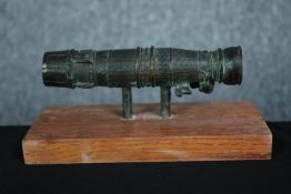 Aviation interest. A bronze jet engine on a wooden stand. Probably an early Rolls Royce engine. H.