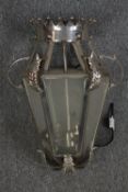 A modern glass ceiling pendant. H.65cm.