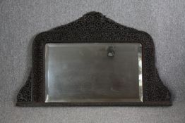 Over mantle carved Burmese hardwood mirror. H.80 W.127cm.