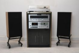 A Sansui R-50 AM/FM Stereo Receiver, Stereo Cassette Deck D-90 and a Sansui SR-B200s 2-Speed Belt-