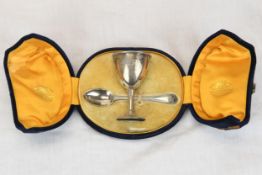 A silver christening set, cased and with English hallmarks.