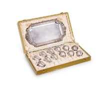 A SET OF LATE 19TH CENTURY SILVERED METAL SHOT CUPS WITH TRAY IN PRESENTATION BOX