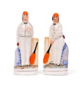 A PAIR OF MID 19TH CENTURY STAFFORDSHIRE FIGURES OF CRICKETERS