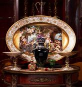 A FINE AND LARGE 19TH CENTURY VIENNA PORCELAIN DISH DEPICTING BACCHUS AND ARIADNE