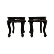 A PAIR OF 19TH CENTURY CHINESE CARVED HARDWOOD AND PARCEL GILT DECORATED STANDS