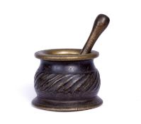 A 16TH CENTURY HISPANO-MORESQUE BRONZE PESTLE AND MORTAR