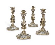 A SET OF SILVER AND SILVER GILT 19TH CENTURY GERMAN CANDLESTICKS, PROBABLY HANAU