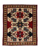 A CAUCASIAN STAR KAZAK RUG, CIRCA 1930
