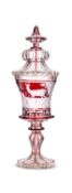 A FINE 19TH CENTURY BOHEMIAN FLASHED RUBY GLASS CUP AND COVER IN THE MANNER OF FRANZ PAUL ZACH