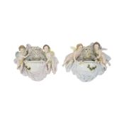 A PAIR OF DRESDEN PORCELAIN CHERUB WALL SCONCES