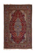 AN EARLY 20TH CENTURY KASHAN CARPET