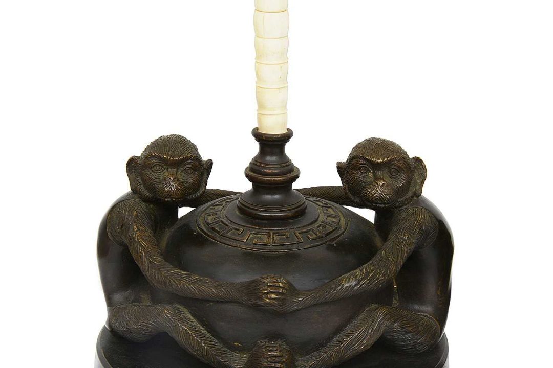 A PAIR OF MID 20TH CENTURY BRONZE AND CAMEL BONE MONKEY CANDLESTICKS - Image 3 of 3