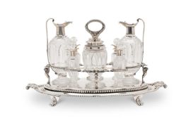 PAUL STORR: A STERLING SILVER AND GLASS GEORGE III PERIOD CRUET SET, 1806