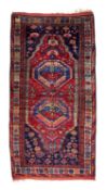 AN EARLY 20TH CENTURY KURDISTAN RUG